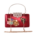 Dettaglio pochette da sera rossa lucida con chiusura ad ape in cristallo e cornice - Rosso