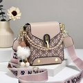Pink minimalist crossbody bag with geometric patterns and a plush doll pendant charm - Khaki