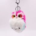Detail of pink, white, and teal faux fur owl plush keychain with silver metal clip - Rose Red