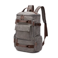 Large grey canvas travel backpack with brown leather accents and multi-pocket structure - Gray