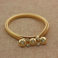 Elastic gold metal belt with spring structure and rhinestone-studded round buckles - Gold Spheres with Rhinestones