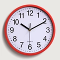 Classic 10-inch round wall clock featuring a bright red frame and white dial face - Red
