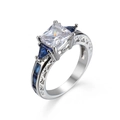Elegant silver ring with square clear main stone and triangle blue sapphire accents - White Gold & Clear Royal Blue
