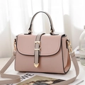 Pink and beige faux leather handbag with grey handles and gold buckle detail - Pink