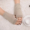Detailed view of the rib-knit cuff design on thick khaki wool fingerless winter gloves - One Size / Deep Beige