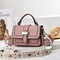 Pink leather handbag with black contrast stitching and ethnic embroidered wide strap - Purple Pink