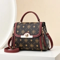 Brown monogram crossbody handbag with red trim and golden metal turn-lock closure - Jujube Red Print