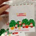 Merry Christmas self-sealing candy bag featuring festive Santa Claus illustration - 10*10+3 Christmas 4 Santas