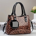 Glossy leopard print tote bag with black faux leather handles and round coin purse charm - Khaki/Earth Yellow