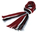 Detail of a thick knitted scarf with red, white, black and grey stripes and fringed edges - Wide Version / Red
