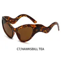 Occhiali da sole cat eye tartarugati con lenti color tè e aste ondulate uniche - Montatura Tartarugata Lente Tè