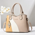 Bolso patchwork tricolor en cuero sintético con colgante de mariposa y asa superior - Amarillo & Caqui