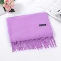 Solid purple cashmere scarf with classic fringe tassels laid on a white surface - Light Purple