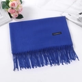 Soft cashmere-feel scarf in solid blue with tassel fringe and elegant label detail - Royal Blue