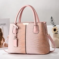 Elegant light pink crocodile texture handbag with gold hardware for women's crossbody wear - Pink