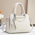 Elegant white litchi grain leather handbag for women with star charm and silver hardware - Off White