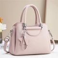 Borsa a mano da donna rosa in pelle martellata con ciondolo a stella e tracolla - Viola