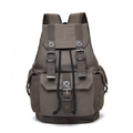 Vintage dark brown canvas backpack with leather buckle straps and side pockets - Coffee
