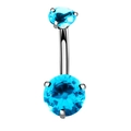 Macro detail of silver stainless steel navel ring with two bright blue round zircons - Lake Blue Zirconia