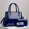 Set di tre borse in pelle verniciata blu scuro con finiture lucide e dettagli dorati - Blu