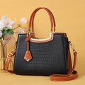 Women's black faux crocodile tote bag with orange handles and golden hardware accents - Black