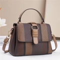 Fashionable woven crossbody bag with brown leather trim and golden ring hardware - Coffee
