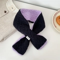 Detail showing knit texture and 100% wool label of the dual-color winter scarf - Purple Navy