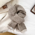Close-up of knit scarf texture with water ripple stripes and ZPKR brand label detail - Dotted Beige
