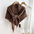 Close-up of dark coffee knit wool triangle scarf draped over a minimal white shirt - Marled Brown (01Ocio)