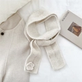 Detail of cream knitted scarf featuring handcrafted 3D crochet flower decorations - Scarf / Beige