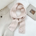 Detail of pink knitted scarf with soft floral texture and elegant rose decoration - Scarf / Pink