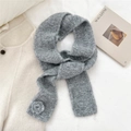 Detail showing the gray knit scarf texture with a handmade crochet flower decoration - Scarf / Light Gray