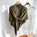 Detail of dark green hollow knit shawl showing delicate crochet texture and stripe patterns - Dark Green