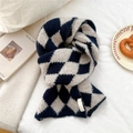 Detail of blue and beige diamond lattice knit scarf showing thick texture and soft finish - Argyle Navy
