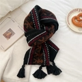 Detailed view of thick knit winter scarf with tassel fringe and ethnic leopard patterns - Thickened Tassel Ethnic Black