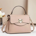 Elegant pale pink crossbody bag with gold hardware and top handle for women - Khaki
