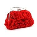 Detail of red satin rose petal layers on the evening clutch with silver metal clasp - Red