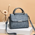 Chic foggy blue crocodile embossed crossbody bag with metallic top handle for women - Blue
