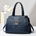 Deep blue crocodile embossed leather handbag with gold V logo and adjustable strap - Blue