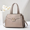 Detail of crocodile embossed leather texture and gold V-shaped buckle on a beige handbag - Khaki