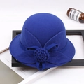 Detail of wool felt fedora featuring handmade floral accent and elegant curved brim - M / Four-leaf Rose / Sapphire Blue