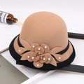 Detail of wool felt cloche hat featuring handmade flower decor with white pearls - M / Beaded Flower with Hemming / Camel