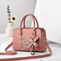Elegant dusty pink embroidered faux leather handbag with floral details and shoulder strap - Pink