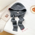 Close-up of gray knit balaclava with red contrast stitching and minimalist label - Gray