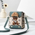 Green leather crossbody phone bag with floral pattern and cute teddy bear charm detail - Green/Print