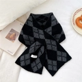 Detail showing the 100% wool material and argyle knit pattern of the warm winter scarf - Black and Gray