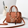 Brown leather handbag with floral embroidery and butterfly charm for women - Earthy Yellow