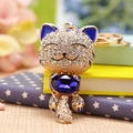 Golden cat keychain with deep blue crystal gemstone and white rhinestones decoration - Royal Blue Lucky Cat
