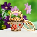 Golden bucket keychain with colorful crystals and prosperity character for car keys - Beige Treasure Bowl