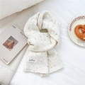 Detailed texture of cream knit scarf with colorful confetti dots and decorative fabric label - 23*160cm / Creamy White